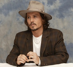 Johnny Depp - "Pirates of the Caribbean: Dead Man's Chest" press conference portraits by Armando Gallo (Los Angeles, June 22, 2006) - 16xHQ HO0W0I6d